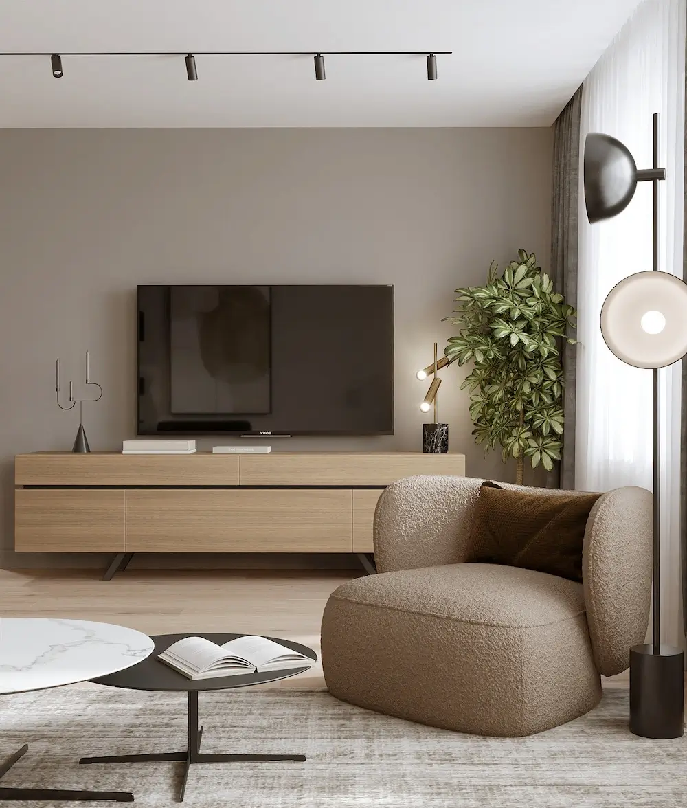 Living room with a TV area, a wooden cabinet, a lounge chair, a coffee table and plants in a modern interior