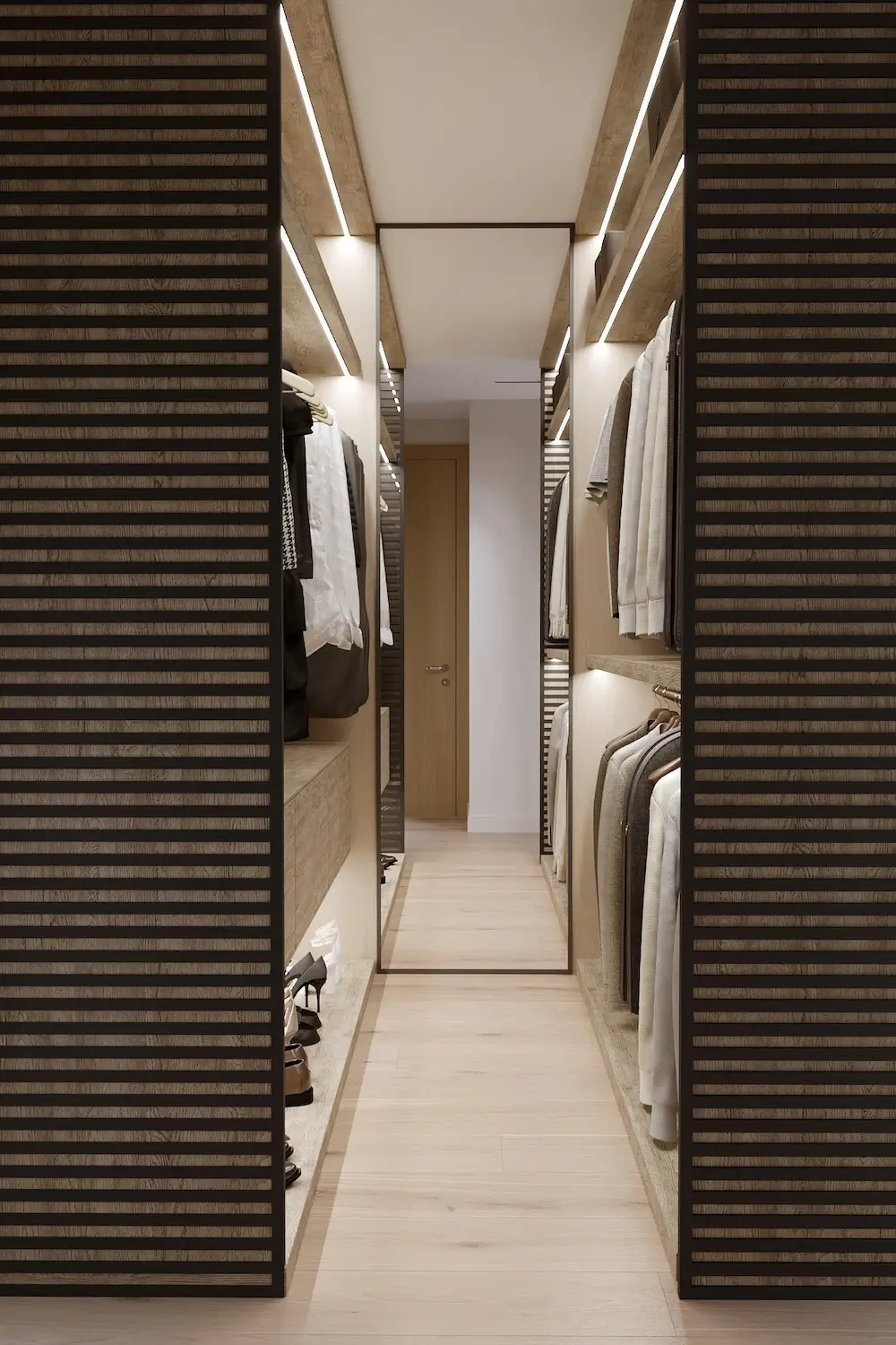 Wardrobe room with a large mirror, wooden shelves, clothes hangers and lighting